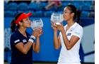 EASTBOURNE, ENGLAND - JUNE 21:  Hao-Ching Chan and Yung-Jan Chan of Chinese Taipei celebrate after winning the Women's Doubles Final at the Aegon International at Devonshire Park on June 21, 2014 in Eastbourne, England.  (Photo by Ben Hoskins/Getty Images)